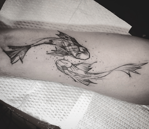 tattoo flor de loto y pez koi