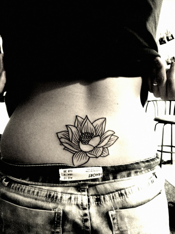 Lower back middle Lotus single flower tattoo