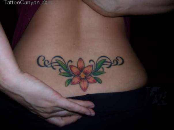 Thai tiger flower tattoo on lower back