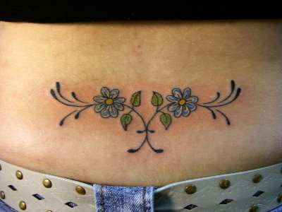 Cute blue ink flower chain lower back tattoo