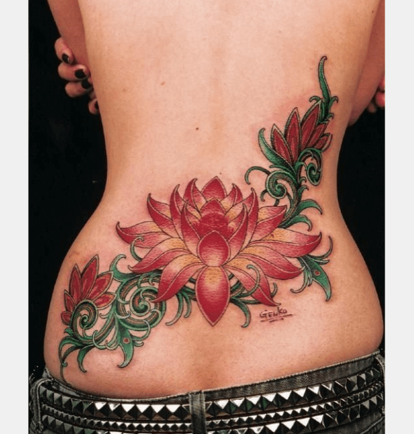Cool lotus branch tattoo on lower back